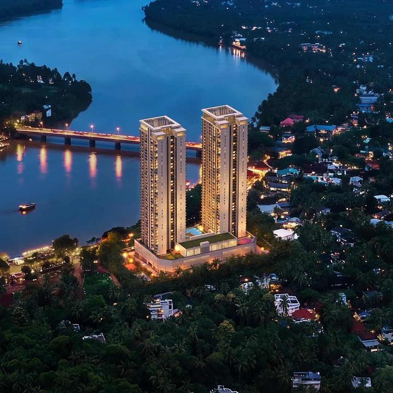 The two wings at dusk above the river